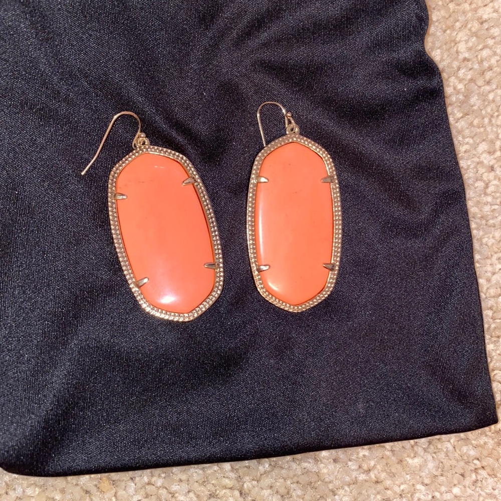 coral stone ks earrings encased in gold